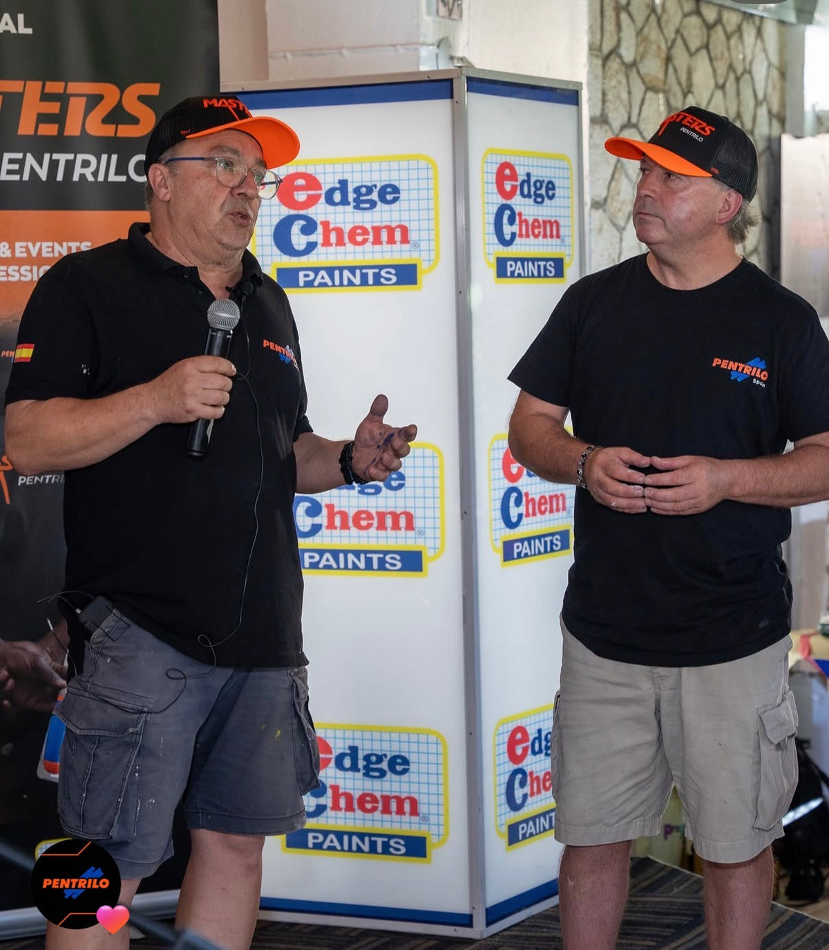 Two trainers giving a live demonstration at a trade event